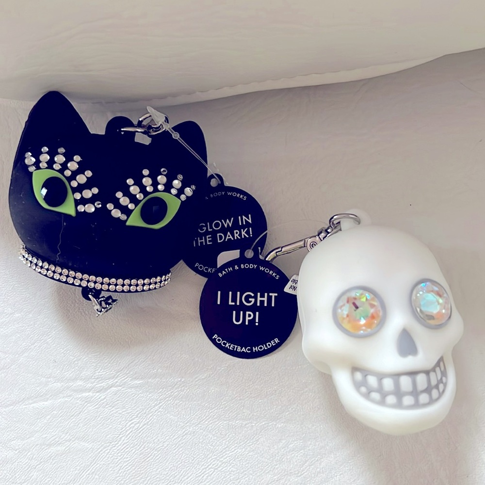 Cat Glow in Dark sanitizer holder, and Skull Light Up sanitizer holder!!